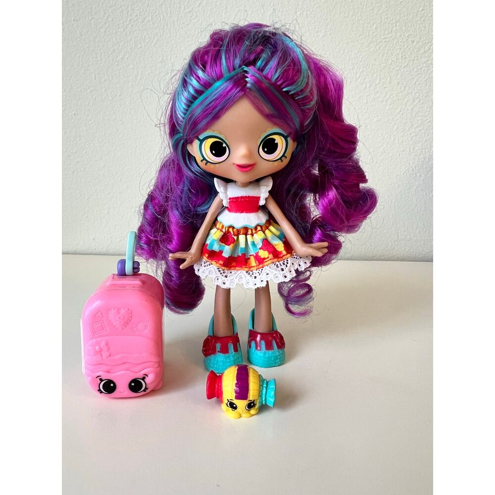 Shopkins Shoppies Rosa Piñata World Vacation Series Themed Dolls with Shopkin